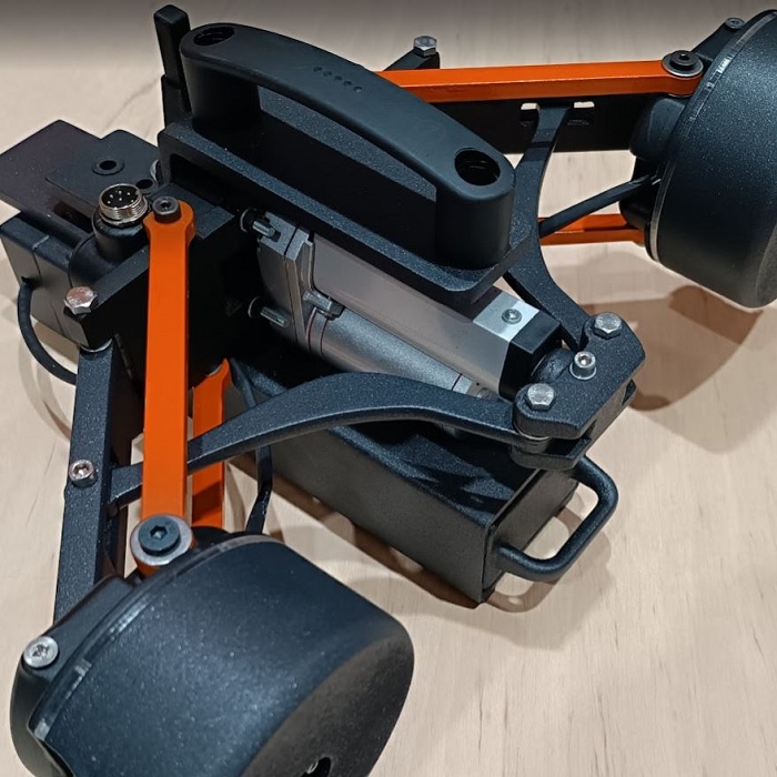Sistema de electrificación para silla de ruedas manual con asistencia motorizada y control integrado